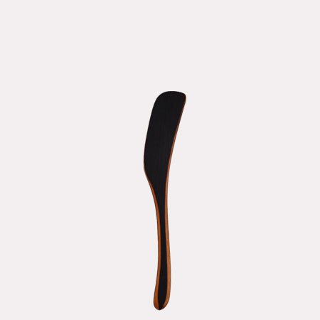 Wooden kitchen utensil, blackened spreader
