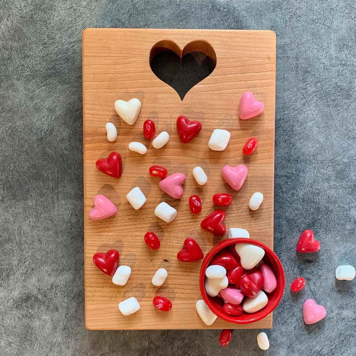 heart chopping board, heart shape cut out of top, wooden cutting board