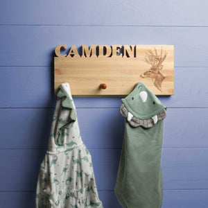 kids coat rack, hangs on the wall with name carved out of wood