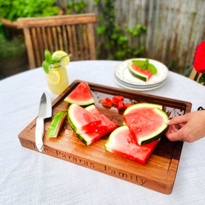cutting board with watermelon, sloped side