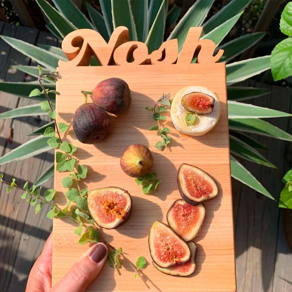 https://wordswithboards.com/cdn/shop/products/mini-cutting-board---nosh.jpg?v=1655771733