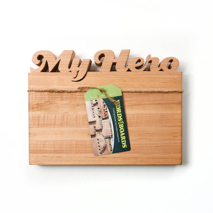 small maple cutting board, the words My Hero carved out on top