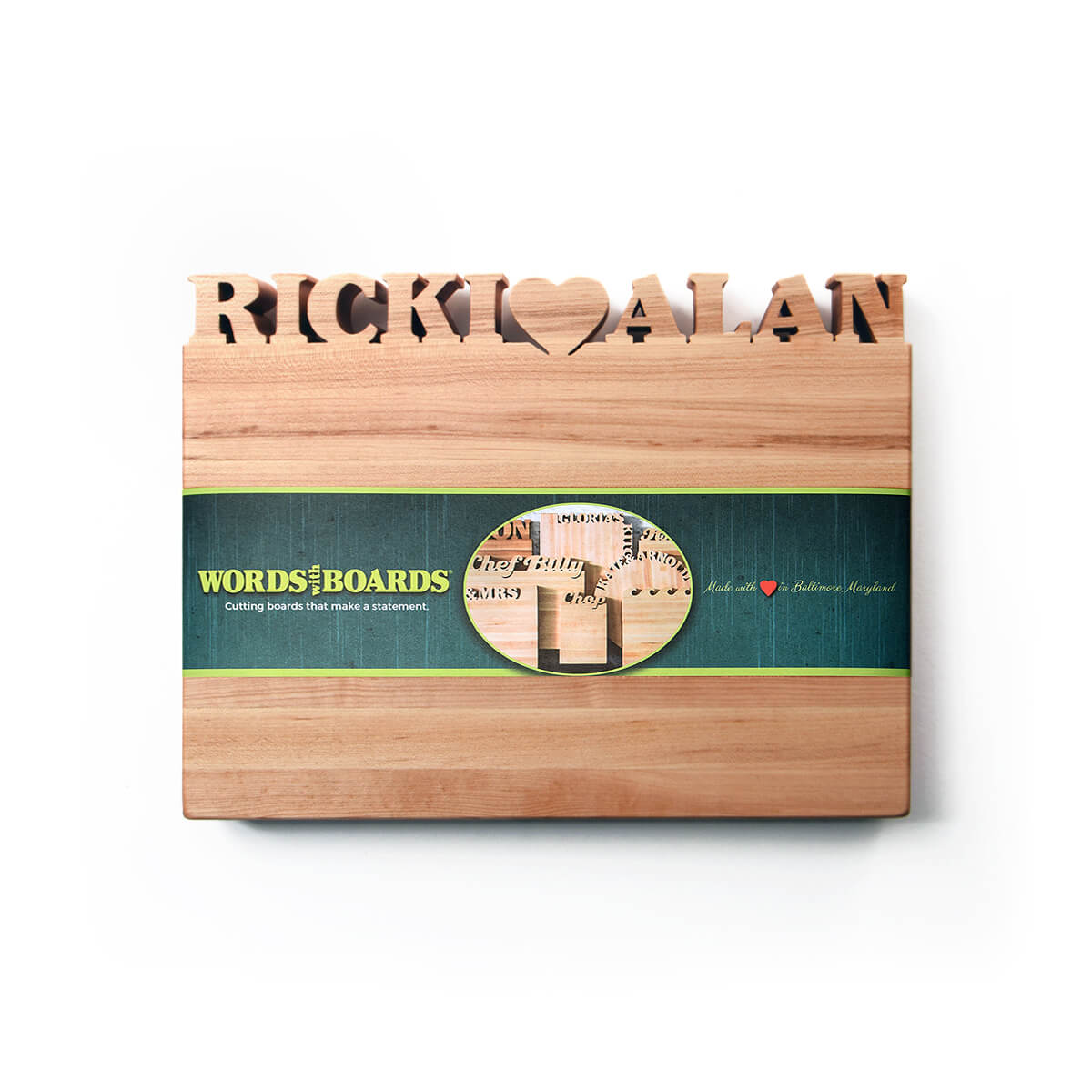 small wood cutting board, names and heart cut out of top