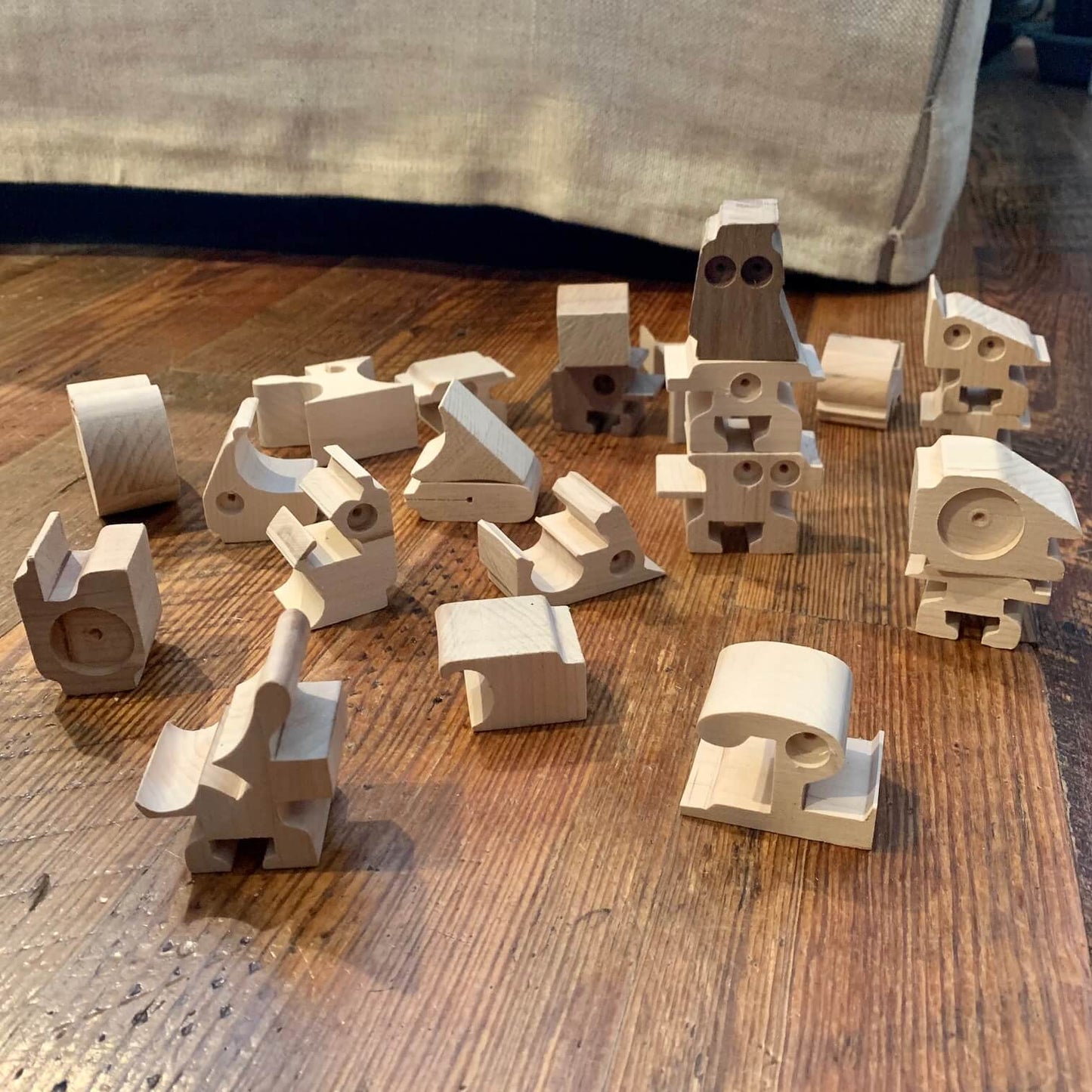 Wooden toys, scrap pieces that look like robots