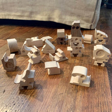 Wooden toys, scrap pieces that look like robots