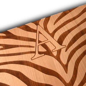zebra decor on a wood cutting board- laser engraved with monogram